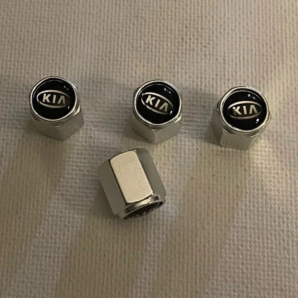 Kia valve stem caps in silver set of 4 NWT